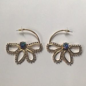 Beautiful and unique Free people flower hoops